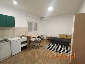 NOVOGRADNJA-NAMEŠTENA GARSONJERA SA TROŠKOVIMA-ADICE